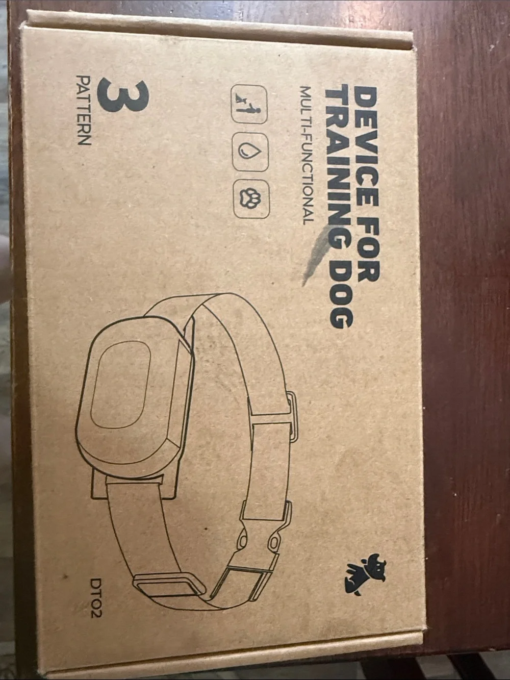 Dog Training Device Collar - Brown Cardboard Packaging